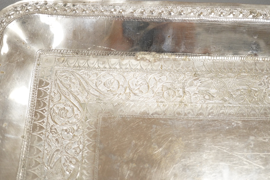 A 20th century Indian colonial white metal tray, with engraved decoration and personal inscription to the base, 39.6cm, 21.1oz.